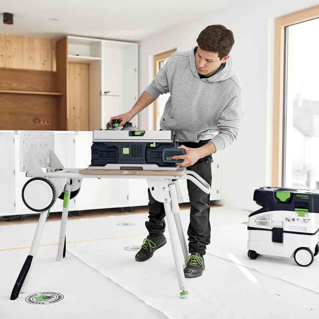 Festool Akku-Tischkreissäge CSC SYS 50 EBI-Plus (mit Kreissägeblatt, Parallelanschlag, Schiebestock, Winkel-Rastanschlag, Spänefangsack, Spaltkeil, Innensechskantschlüssel, Energie-Set)